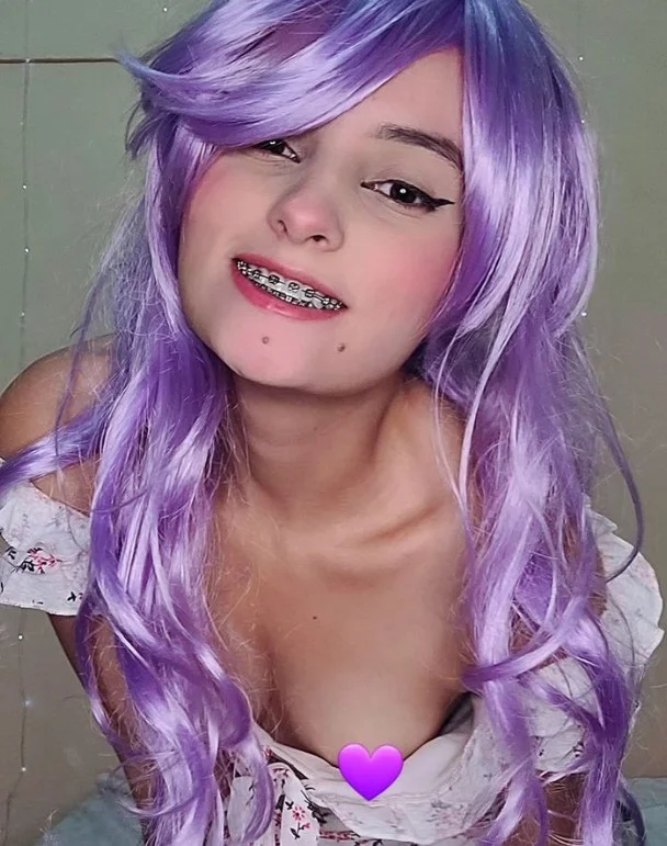 Lotus de Jade (@lotusdejade) Braces OnlyFans model sexy picture in her purple hair