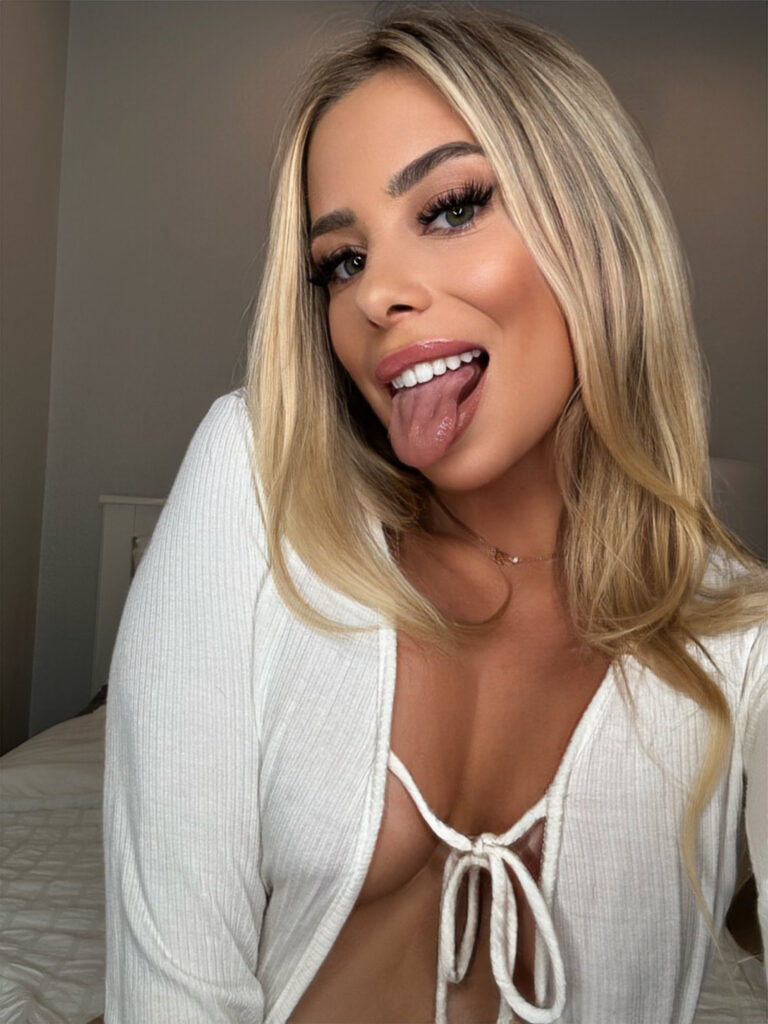 @mileymayes Miley Mayes Hereford OnlyFans takes photo with her sexy tongue out 